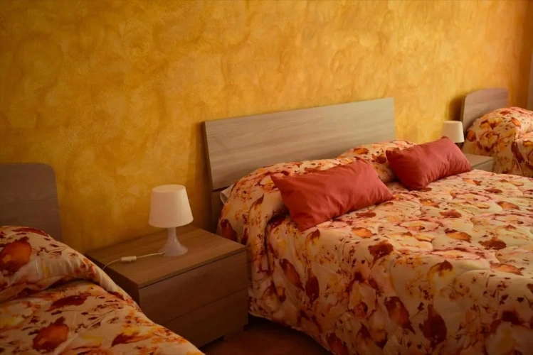 Standard Quadruple room with garden view