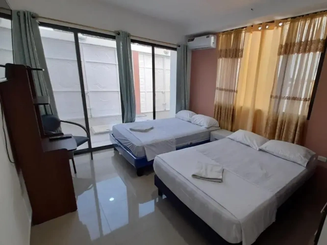 Standard Quadruple room with garden view