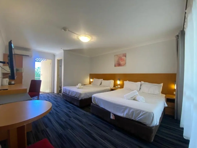Deluxe Quadruple room with balcony