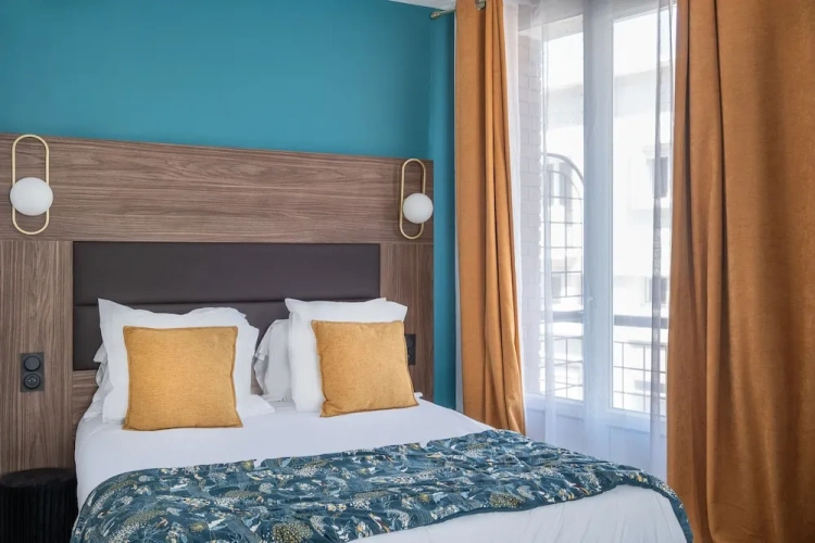 Executive Quadruple room with balcony and with city view