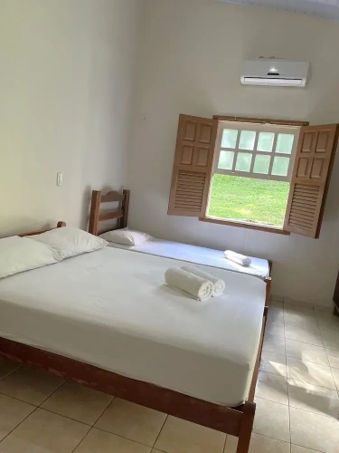 Standard Quadruple room with garden view