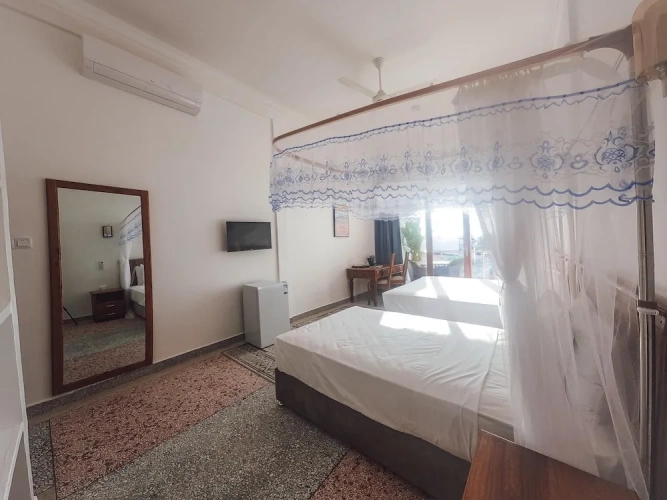 Deluxe Triple room with garden view