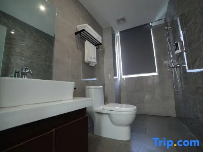 Aichenshi Hotel (Baoding Tianxia Baobai Shopping Plaza)