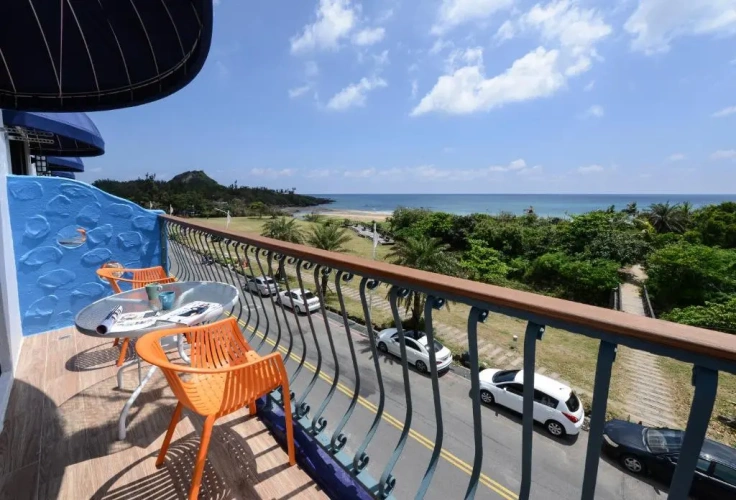 Deluxe Quadruple room with balcony and with sea view