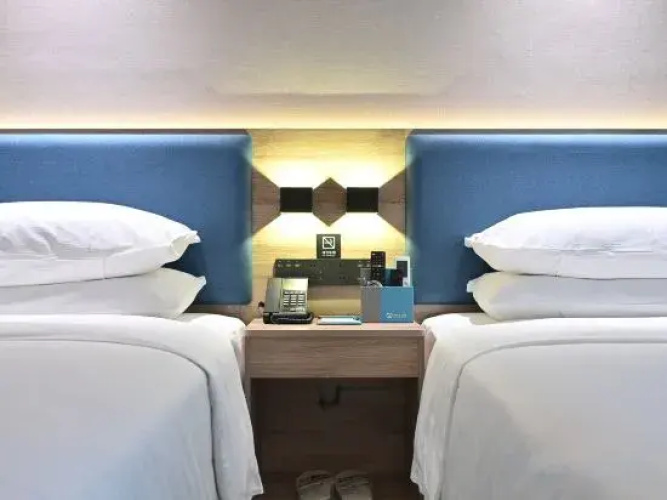 Happy Aile Hotel (Hezhou Lingfeng Square)