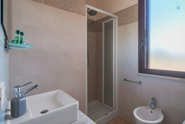Deluxe Quadruple room with courtyard view