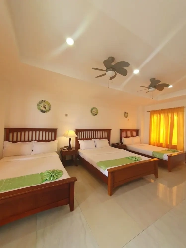 Deluxe Triple room with balcony and with pool view