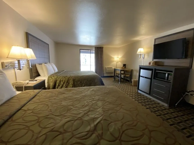 Deluxe Quadruple room with balcony