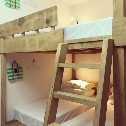 Bed in Dorm (female dorm) with balcony