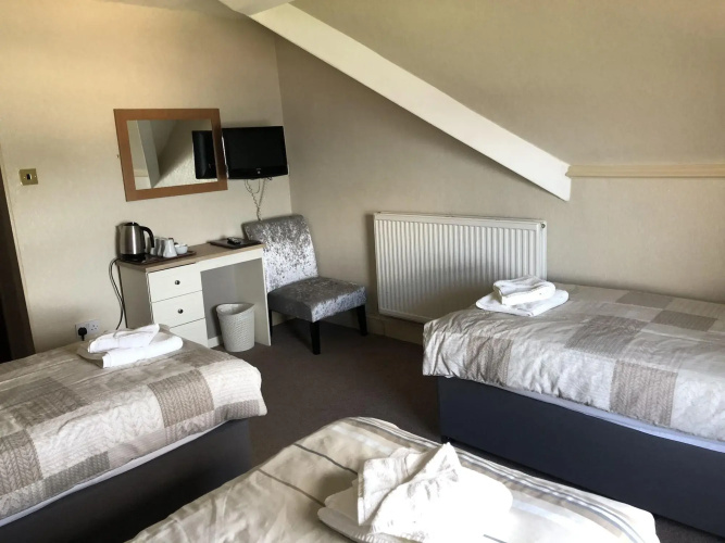 Nomi Rooms & Restaurant