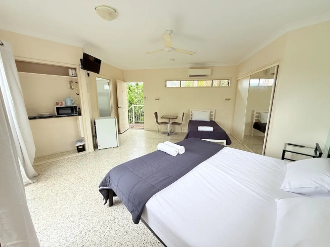 Standard Twin Family room with balcony and with pool view