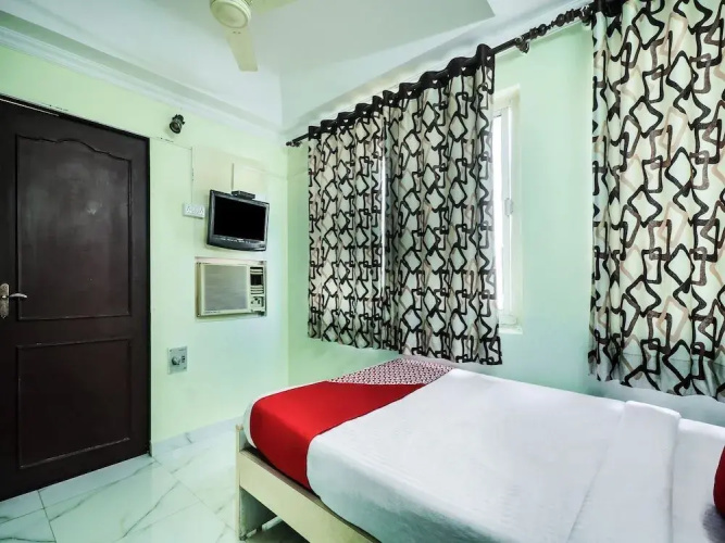Om Hotel by OYO Rooms