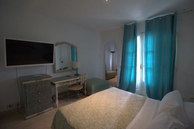 Standard Triple room with balcony and with garden view