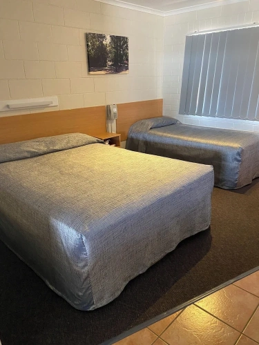 Standard Triple room with garden view