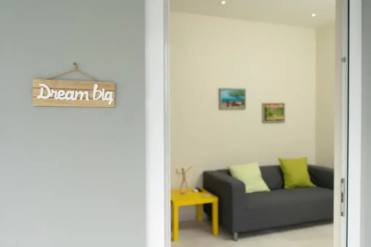 Hideout Suites - steps from Eagle Beach
