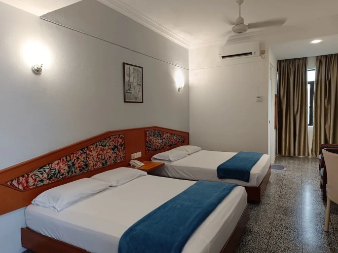 Standard Triple room with city view