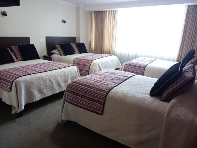Deluxe Quadruple room with balcony and with view