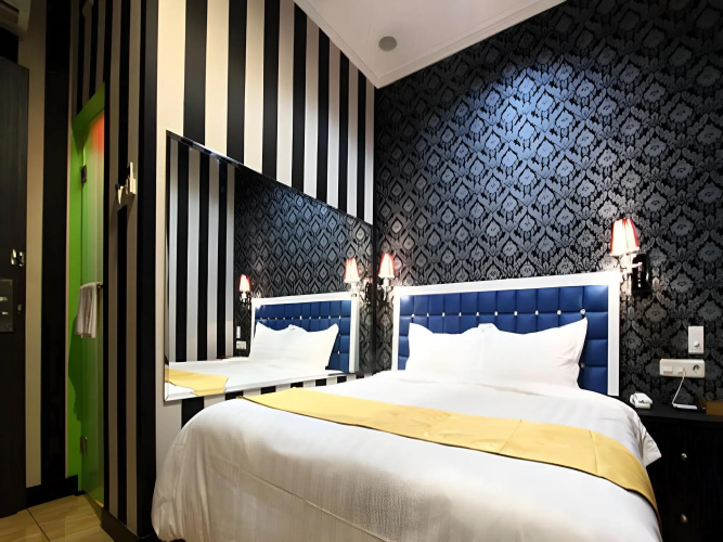 Amos Cozy Hotel & Convention Hall