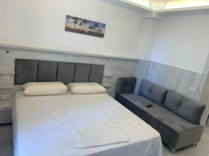 Standard Triple room with garden view