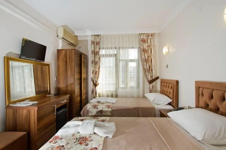 Standard Triple room with sea view