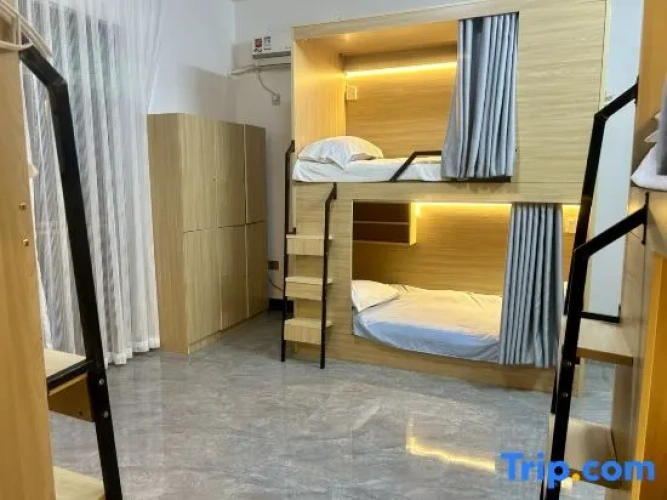 Bed in Dorm (female dorm) with balcony and with sea view