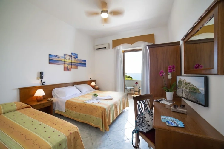Standard Triple room with balcony and beachfront