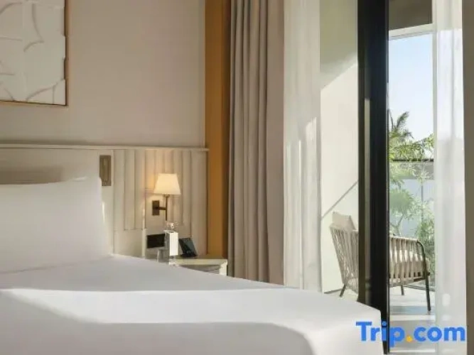 Rising Light Twin Guestroom with Patio and Garden View on the Ground Floor