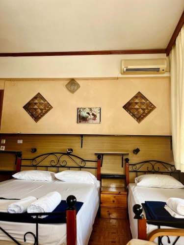 Classic Triple room with balcony and with sea view