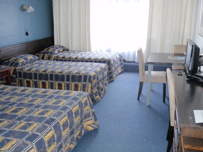 Standard Quadruple room with garden view