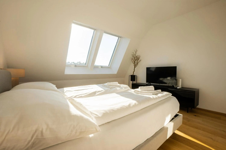 2-story penthouse with designer renovation for 2 people. A 15-minute walk to the city center
