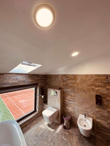 Deluxe Quadruple room with balcony