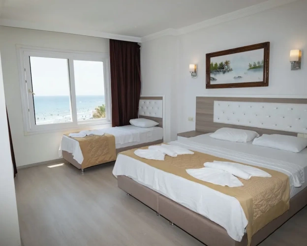 Standard Quadruple room with balcony and with sea view