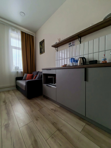 Uyutnaya Studiya v Stile Loft Flat