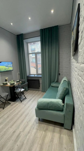 Фотография номера квартиры Апартаменты Двухуровневые 21 в апарт-отеле Счастливое путешествие