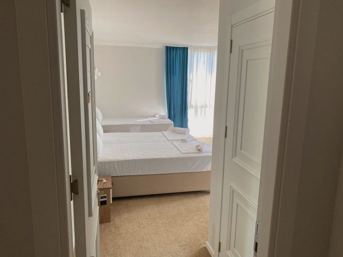 Deluxe Quadruple room with balcony and with view