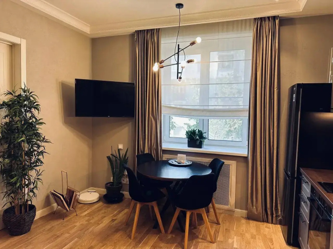 V Tsentre Goroda Apartments