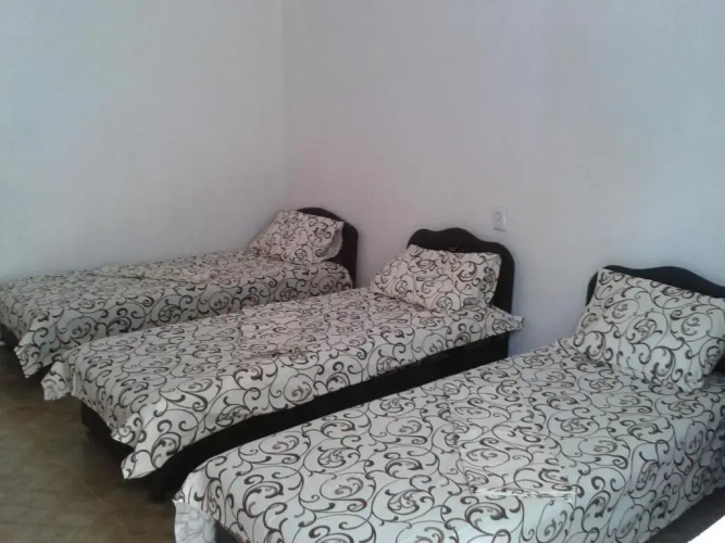 Фотография номера гостевого дома Номера у моря