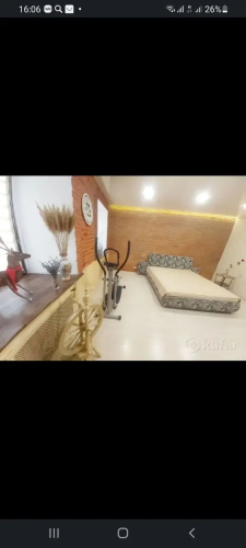 V Tsentre Goroda Apartments