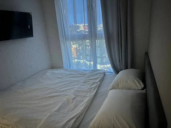 Фотография номера квартиры Апартаменты с КОНДИЦИОНЕРОМ и панорамным видом из окна 24/7