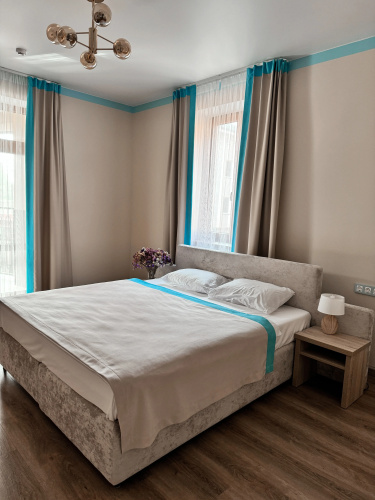 Двухместный номер Comfort с балконом двуспальная кровать