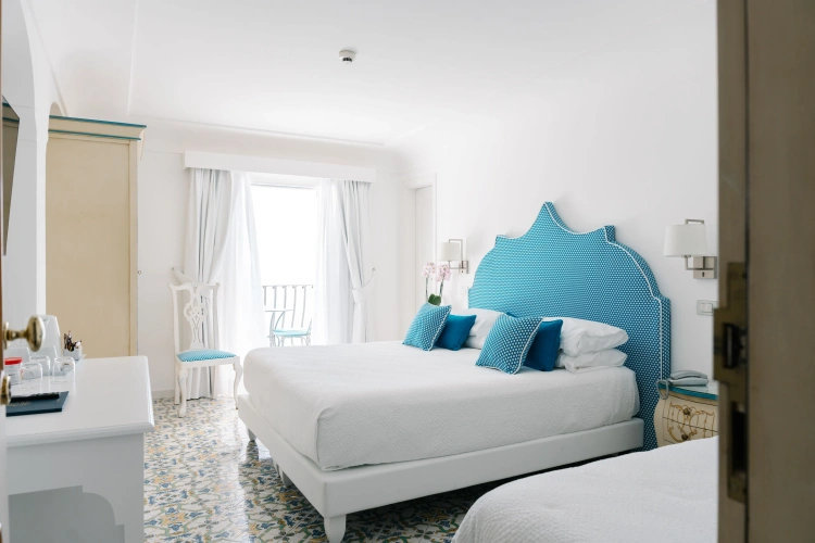 Superior Triple room with balcony and with sea view