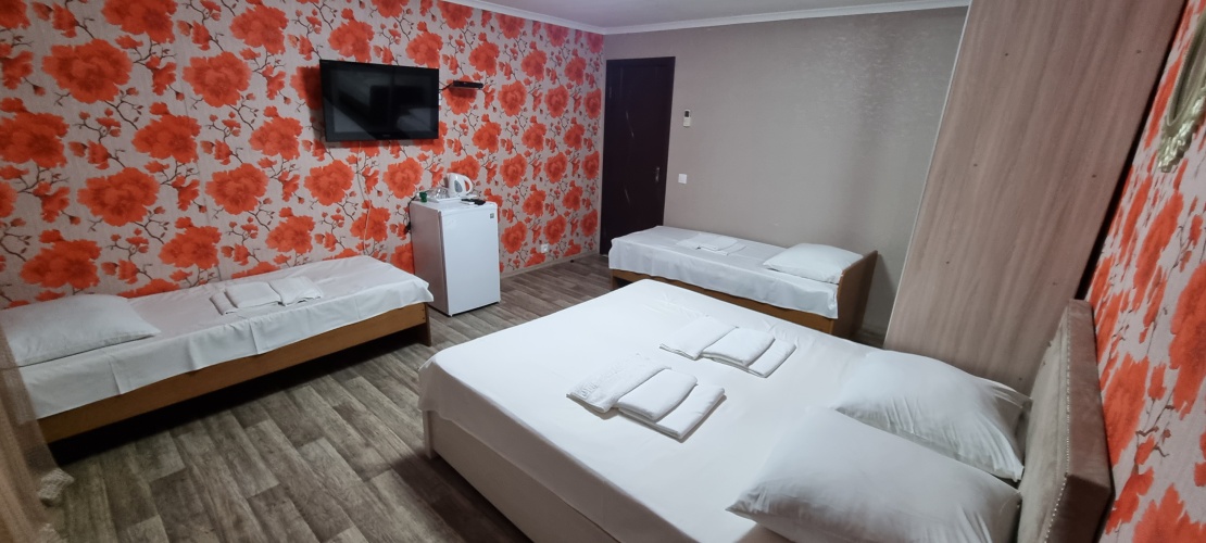 Standard Quadruple room with balcony and with sea view