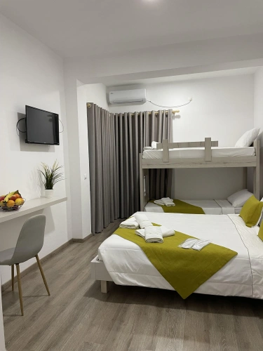 Standard Quadruple room with balcony and with sea view