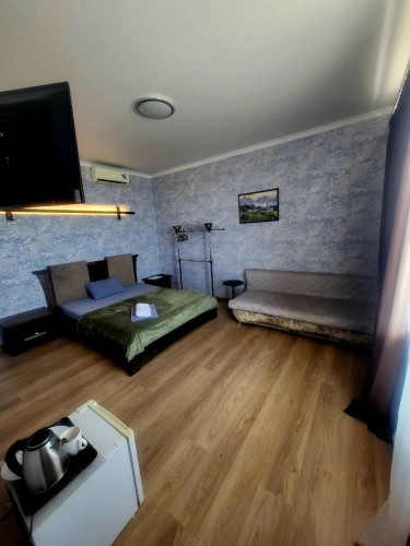Economy with sofa Quadruple room with view