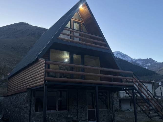 Фотография номера Коттеджа Частный дом Уютный Котедж в Степанцминда