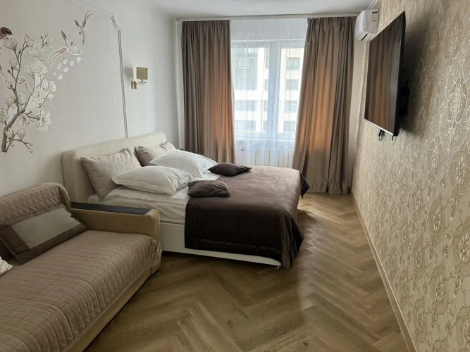 Фотография номера квартиры Апартаменты Beige на проспекте Куприна 34к1