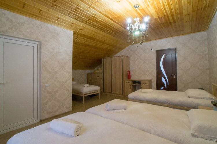Deluxe Quadruple room with balcony