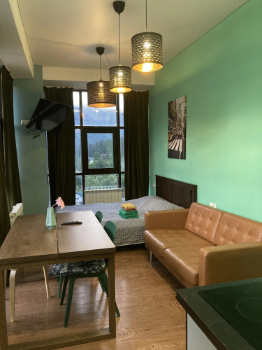 Фотография номера квартиры Апартаменты Евродвушка в центре Домбая