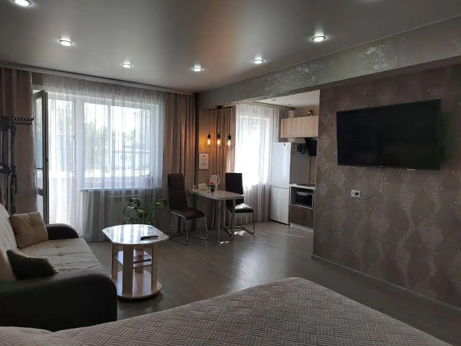 Фотография номера квартиры Квартира Чистая и уютная студия Люкс в центре города для отдыха и времяпровождения