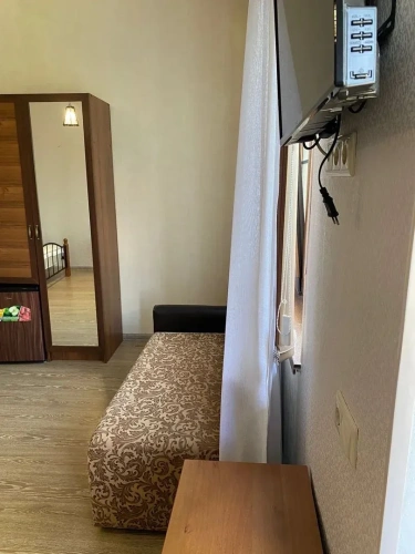 Standard Triple room with courtyard view